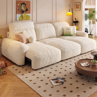 Cream chenille power sofa bed in a living room