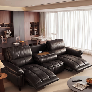 Dark leather power recliner sofa in a living room