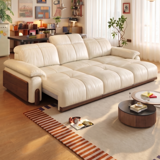 Cream leather power sofa bed with rubberwood side panels
