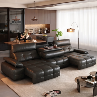 Black leather power sofa bed in a living room