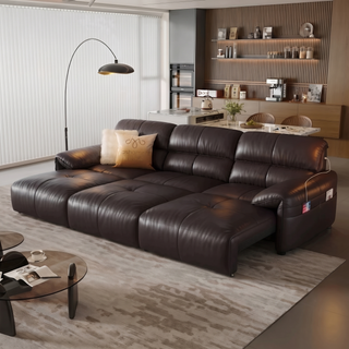 Dark-brown leather power sofa bed in a living room