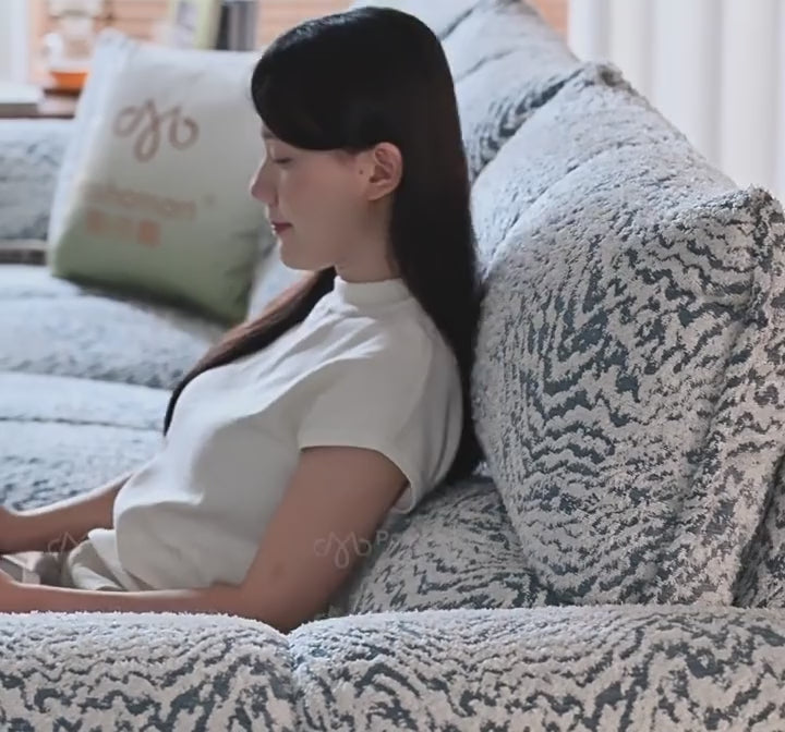 Two-tone power recliner sofa in use