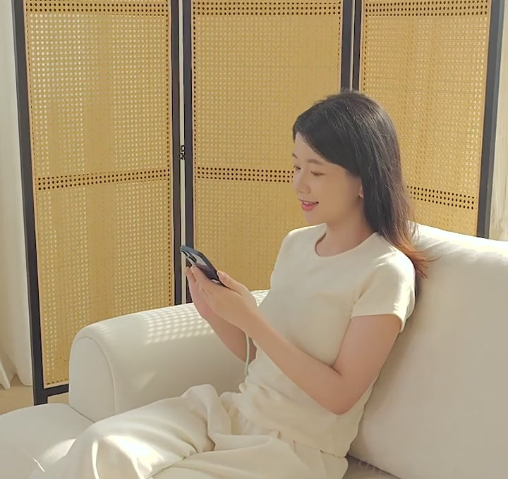 Cream fabric sofa in everyday use